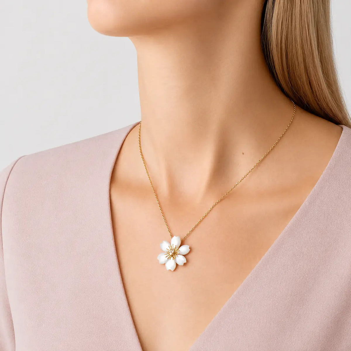 Van Cleef & Arpels Rose de Noël collection mini pendant with mother-of-pearl and diamonds
